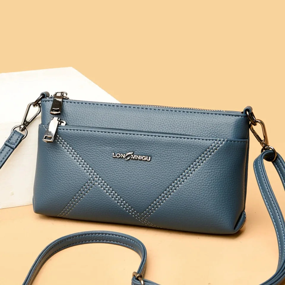 aline™ – elegant crossbody skulderveske